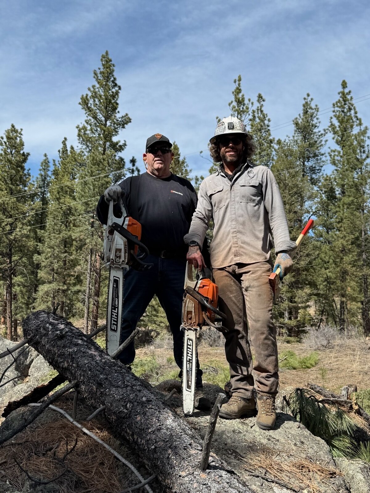 The Over The Top crew on a Butte job site with their saws
